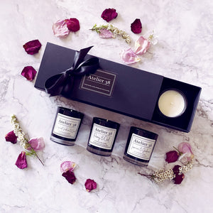 Black gift box of 3 votives. Floral scents: Jasmine & Gardenia; Peony & Oud; Bergamot, Verbena & Basil.